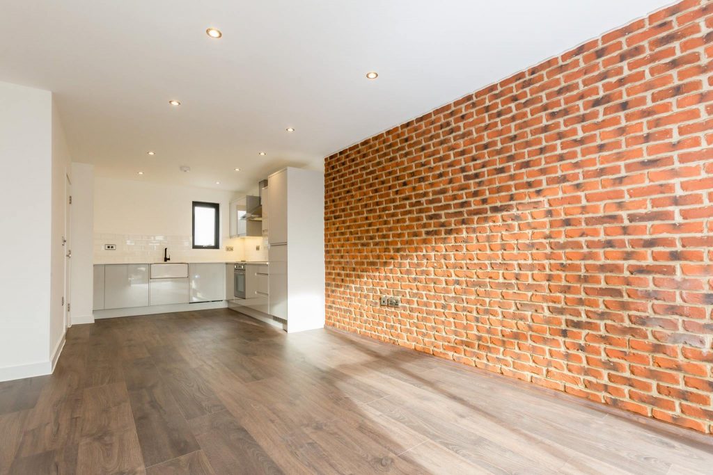 A brick slip feature wall using rustic brick slips