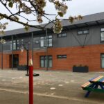 Newbury red brick slips installed at Ambergate Sports College