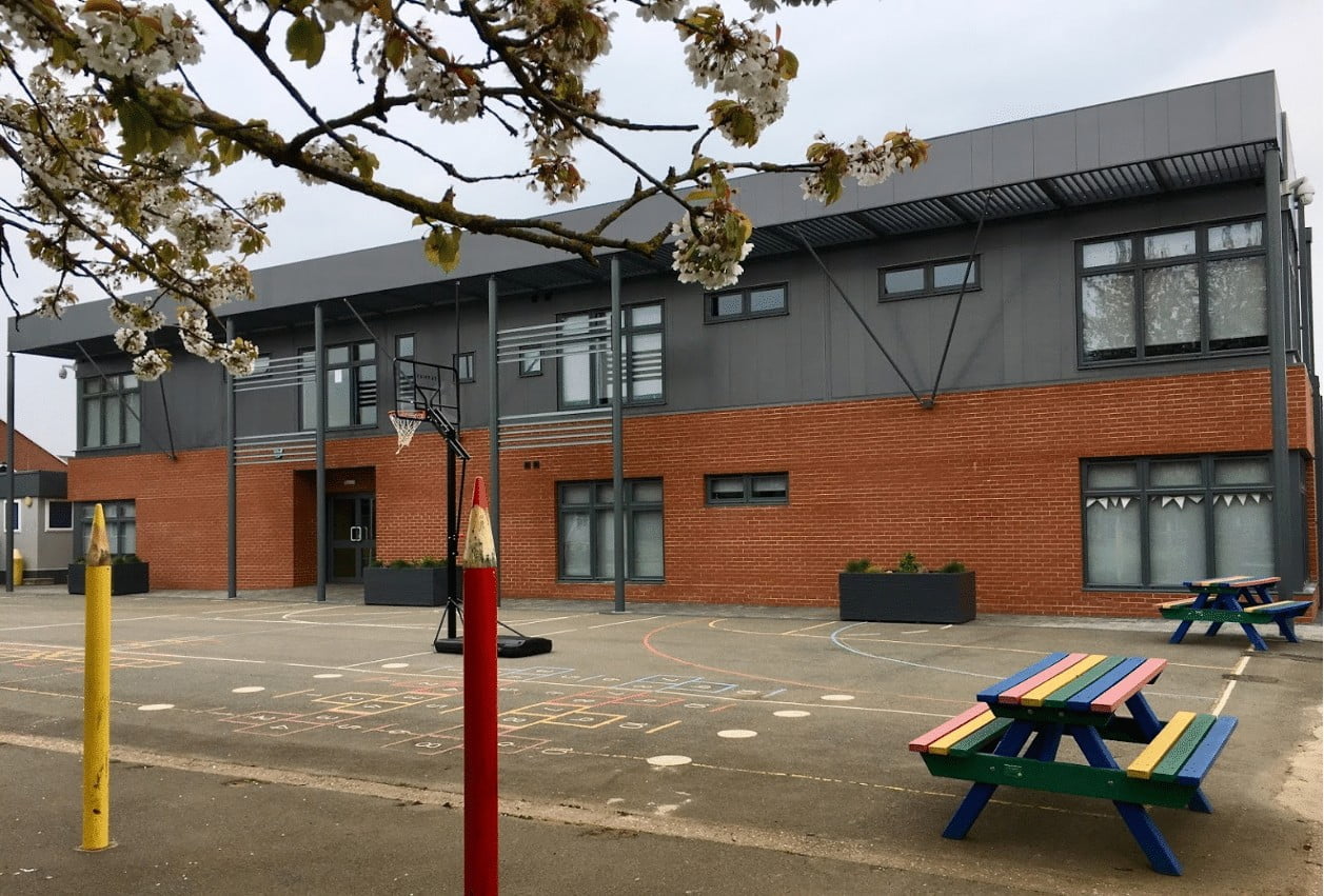 Newbury red brick slips installed at Ambergate Sports College