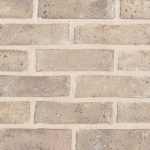 Cobalt Yellow brick slips pointed with light buff coloured mortar.