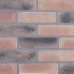Epsom Buff Multi brick slips pointed with grey coloured mortar.