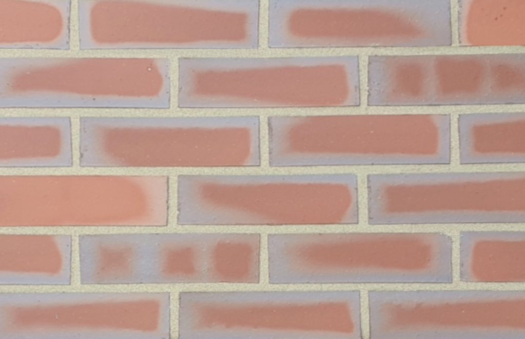 Burslem brick slips pointed with light buff coloured mortar.