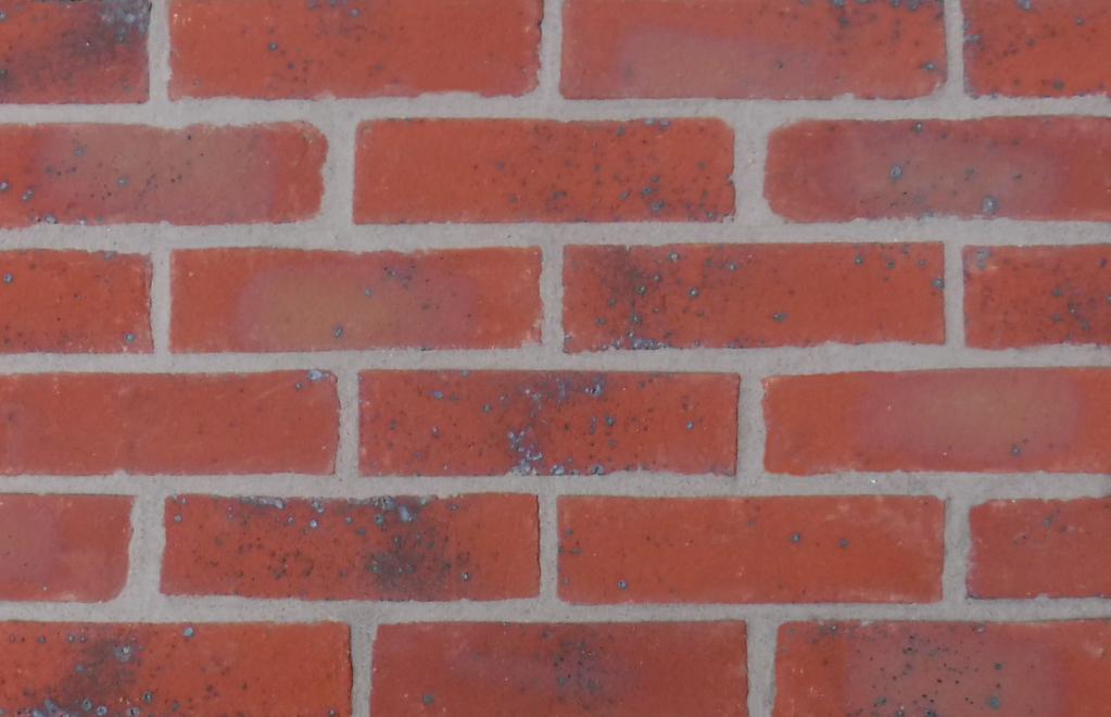 Heathfield Multi brick slips pointed with grey coloured mortar