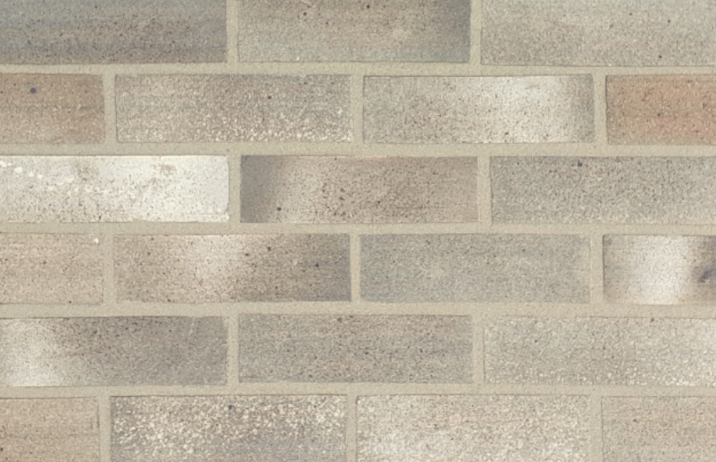 St Andrews brick slips pointed with buff coloured mortar.