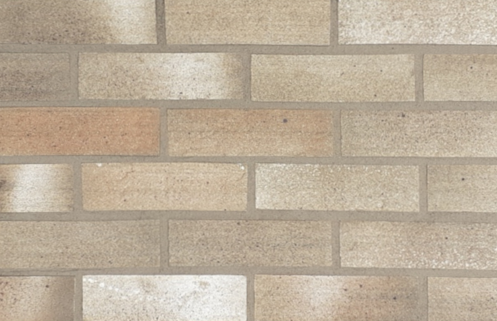 St Andrews brick slips pointed with grey coloured mortar.
