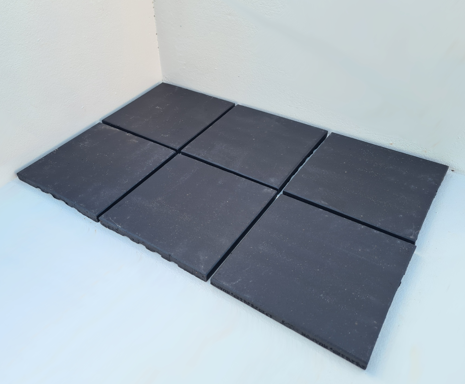 An image of anthracite black quarry tiles (150 x 150 x 12mm)